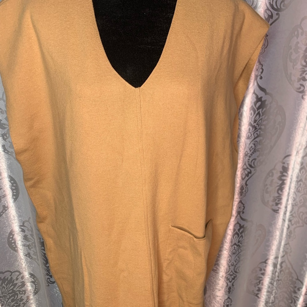 Oversized versatile lounge tunic front pocket side slits can be layered